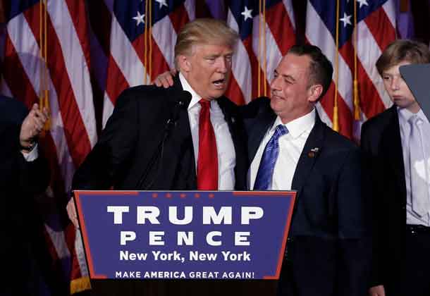 President-elect Donald Trump and Chairman of the Republican National Committee Reince Priebus address supporters during his election night rally in Manhattan. REUTERS/Mike Segar