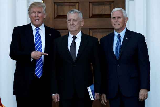 U.S. President-elect Donald Trump (L) and Vice President-elect Mike Pence (R) greet retired Marine General James Mattis in Bedminster, New Jersey, U.S., November 19, 2016. REUTERS/Mike Segar/File Photo