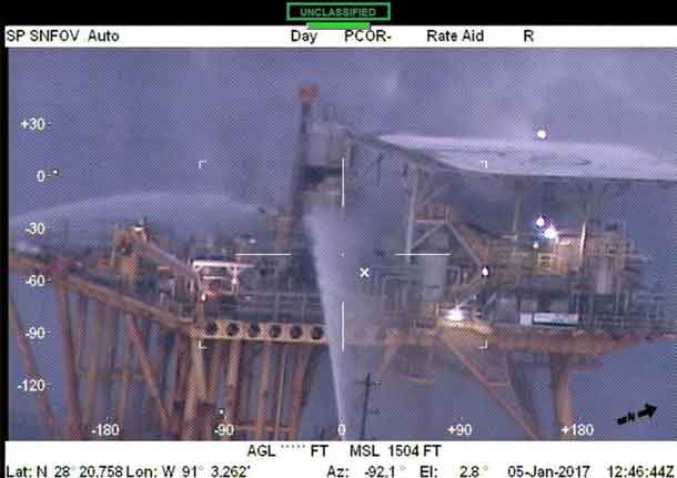 Four offshore supply vessels extinguish a fire on an oil production platform fire near Grand Isle, Louisiana, January 5, 2017. There were four people aboard the platform who evacuated into the water and were recovered by the offshore supply vessel Mary Wyatt Milano. There were no reported injuries. (Coast Guard imagery courtesy of Coast Guard Aviation Training Center Mobile)