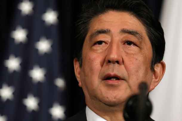 Japanese Prime Minister Shinzo Abe delivers remarks on North Korea accompanied by U.S. President Donald Trump at Mar-a-Lago club in Palm Beach, Florida U.S., February 11, 2017. REUTERS/Carlos Barria