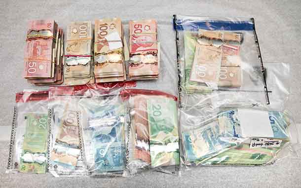 Part of the cash seized by OPP and Ottawa Police in a drug raid