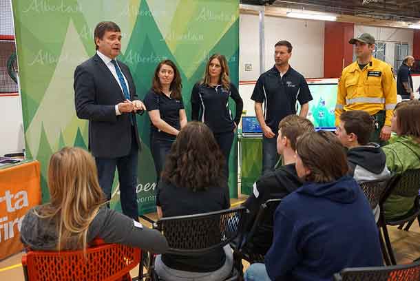 Agriculture and Forestry Minister Oneil Carlier discusses the enhancements to wildfire protection legislation and regulations with participants at the Forest Industries Career Day 2017 in Whitecourt