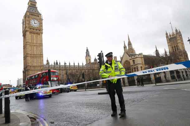 Police tapes off Parliament Square after reports of loud bangs, in London, Britain, March 22, 2017. REUTERS/Stefan Wermuth