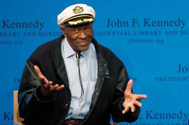 Chuck Berry gestures to the audience at the 2012 Awards for Song Lyrics of Literary Excellence awarded to both he and Leonard Cohen at the John F. Kennedy Presidential Library and Museum in Boston, Massachusetts February 26, 2012. REUTERS/Jessica Rinaldi/File Photo