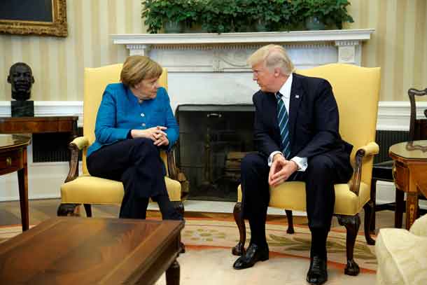 U.S. President Donald Trump meets with Germany's Chancellor Angela Merkel in the Oval Office at the White House in Washington, U.S. March 17, 2017. REUTERS/Jonathan Ernst