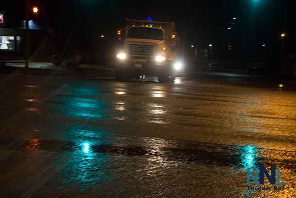Thunder Bay Road Crews were out Tuesday night putting down a layer of ice melting material
