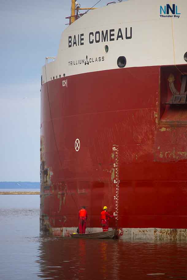 Painting the Canada Steamship Lines Baie Comeau at Canada Malting in Thunder Bay on May 23 2017.