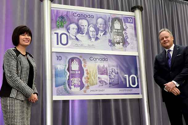 On 7 April 2017, the commemorative bank note celebrating Canada’s 150th anniversary of Confederation was unveiled at the Bank of Canada’s head office in Ottawa. Pictured from left to right: Ginette Petitpas Taylor, Parliamentary Secretary to the Minister of Finance and Stephen S. Poloz, Governor of the Bank of Canada To learn more visit: www.bankofcanada.ca/banknote150 (CNW Group/Bank of Canada)