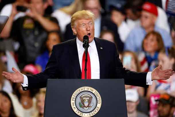 U.S. President Donald Trump appears on stage at a rally in Harrisburg, Pennsylvania, U.S. April 29, 2017. REUTERS/Carlo Allegri