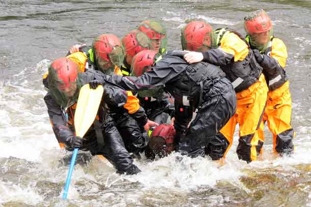 Soldiers learn to move individually and in teams in white water.