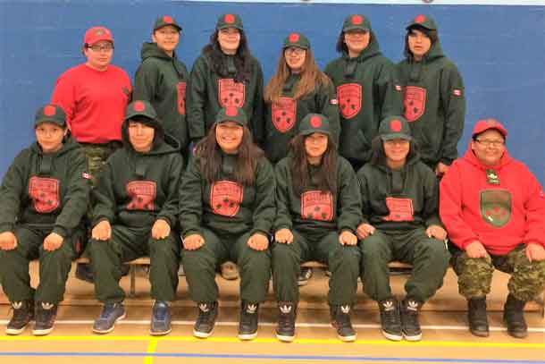 The 10 members of the Junior Canadian Ranger team representing Northern Ontario with their Canadian Ranger escorts.