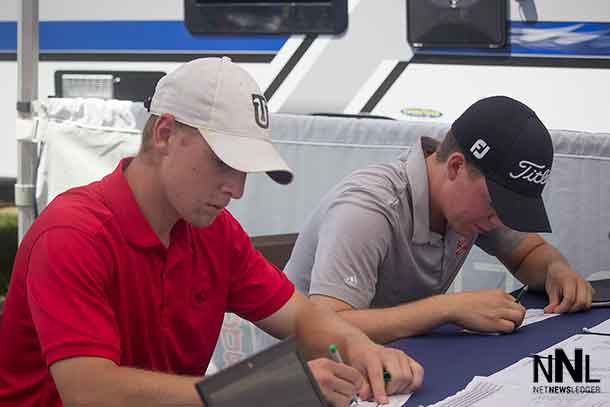 Local Thunder Bay Players Dustin Barr and Evan Degrazi at the scoring tent after their second round at the Staal Foundation Open