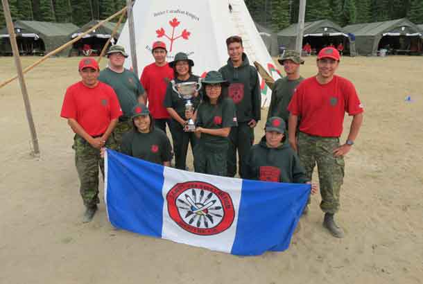 Some of the Sandy Lake Junior Canadian Rangers with the trophy for the province's Best Junior Ranger patrol. - Credit Sergeant Peter Moon, Canadian Rangers