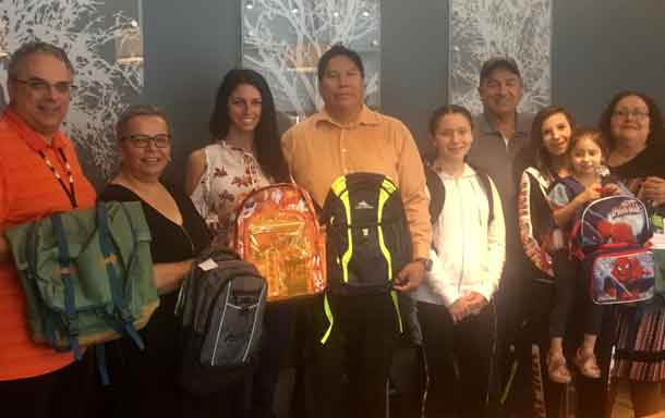 Pictured (left to right): Jeffrey Busniuk-Director of Finance-FWFN, Karen Bannon-Director of Health & Community Services-FWFN, Brittany Collins-Education Assistant-FWFN, Aaron Kakepetum-Senior Account Manager, First Nation Banking-RBC, Daanis Pelletier-student from FWFN, Peter Collins-Chief of FWFN, Tashina Szyja & Saydee Rae Waller-parent & student from FWFN, Myra Bannon-Education Manager-FWFN.