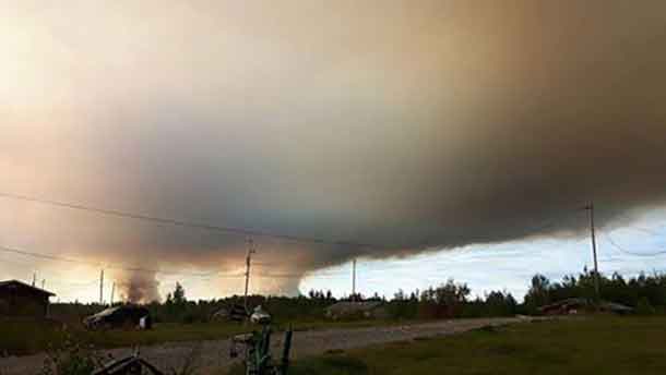 A wild fire near the northern community of Summer Beaver has forced an evacuation