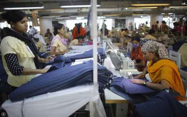 Employees work in a factory of Babylon Garments in Dhaka, Bangladesh, in this January 3, 2014, archive photo. REUTERS/Andrew Biraj