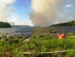 An Incident Management Team is in place to manage the fire and limit its spread toward the community of Nibinamik to the south.