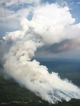 A smoke column was visible from the TransCanada highway and Nipigon as it burned in the Kama Hill Area. Aggressive air attack was carried out with four CL-415 heavy waterbombers on the fire and once it is safe, FireRanger crews will be positioned for ground attack.