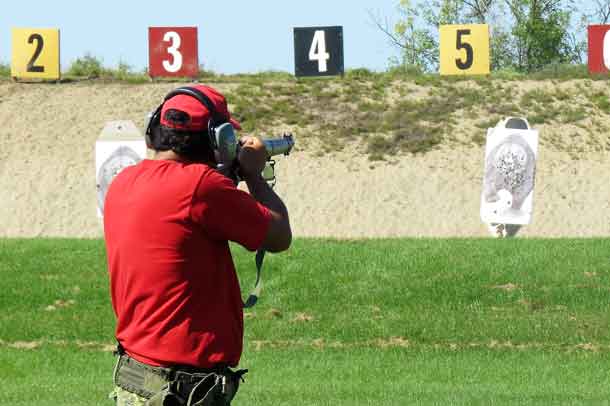 Master Corporal Christopher Keesic of Moose Factory shoot at a Bear Attack target.