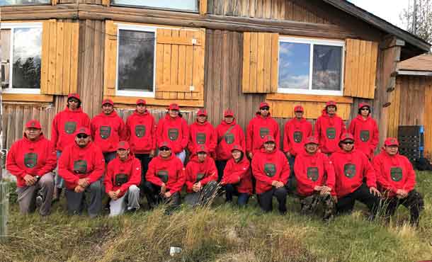 Nibinamik's new Canadian Rangers pose for a group picture.