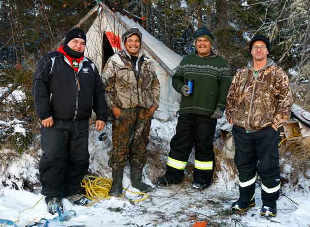 Missing trapper James Chapman, second from left, with his rescuers, from left, Sergeant Matthew Gull, Master Corporal Mike Koostachin, and Corporal Maurice Mack. Photo by Jason Hunter Canadian Ranger