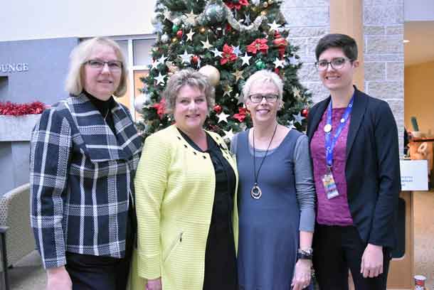 Celebrating the generosity of donors this giving season are (L-R): Jody Nesti, Chair, Board of Directors, Thunder Bay Regional Health Sciences Foundation; Lisa Beck, Director, Critical Care and Emergency Services, Thunder Bay Regional Health Sciences Centre; Pamela Peterson, Family member of patient who required emergency trauma care; and Lindsay Doran, e-Philanthropy Officer, Thunder Bay Regional Health Sciences Foundation. Donations are being gratefully accepted to fulfill the remaining items on the Health Sciences Foundation's Christmas Wish List to ensure patients and families have the gift of time together. Donors on Giving Tuesday already graciously raised $30,456 towards the total value of $83,881 for items on the Wish List, including fully funding 2 Bili Blankets.