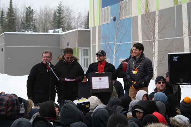 Greeting the people outside the school in Pikangikum