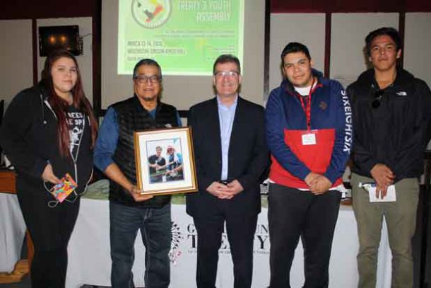 Kenora MP Bob Nault, Slate Falls Chief Lorraine Crane, and Minister of Indigenous Services Jane Philpott, cheers glasses of clean water during a celebratory luncheon at Bimaychikamah School in Slate Falls First Nation following the grand opening of the community's new water treatment plant on Tuesday, March 12, 2018.