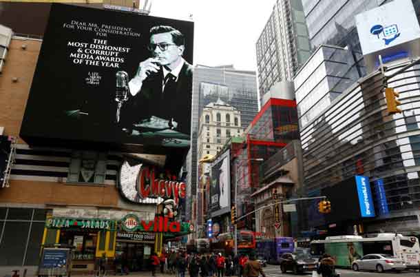 A billboard for late-night talk show host Stephen Colbert is seen near Times Square in the Manhattan borough of New York City. New York, U.S., January 16, 2018. REUTERS/Mike Segar