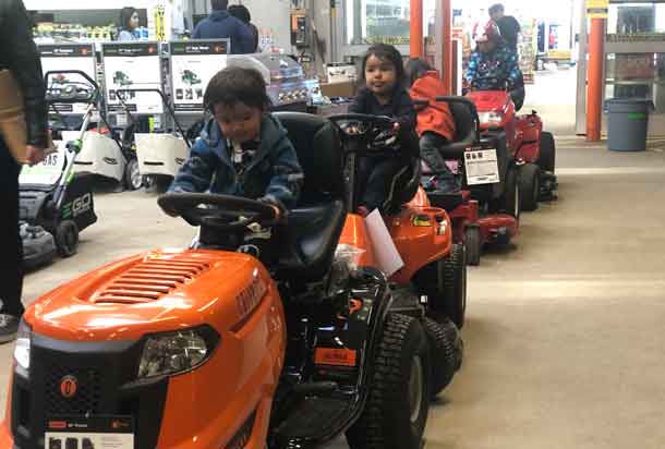 Spring is here and as you can see lawn care is on the mind of these youths at Home Depot. Well maybe its just the cool lawn mowers