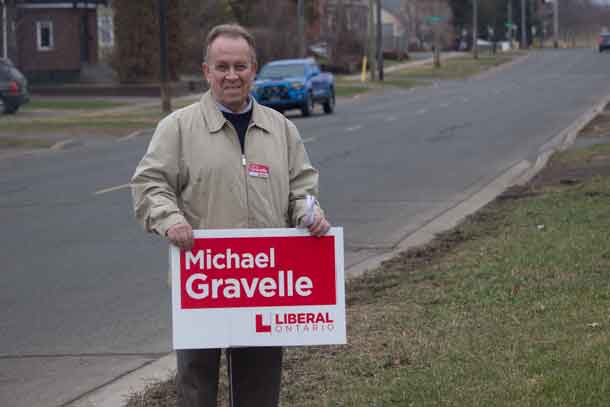 Michael Gravelle campaigning on Algoma Street Wednesday night.