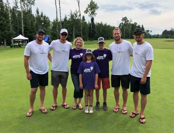 Director Ashleigh and campers Nevaya and Zeke with the Staal Brothers.