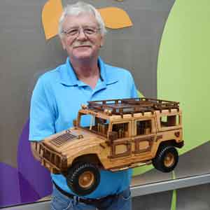 These detailed hand-crafted models took Bruce over 150 hours to create out of oak, walnut, and blood wood. All three vehicles will be auctioned on eBay in support of vital medical equipment at Thunder Bay Regional Health Sciences Centre.