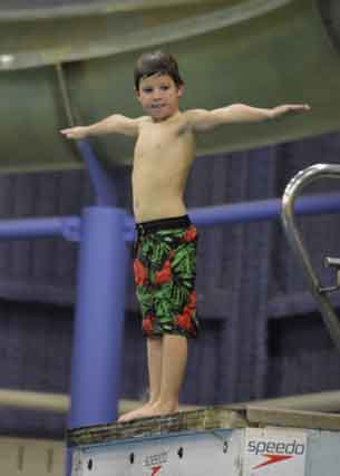 Thunder Bay Diving Club - Walker a local youth on the diving board