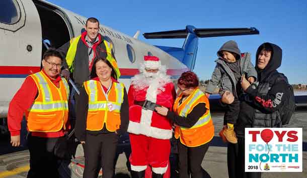 North Star Air Counter Staff and PC12 Captain with Santa and passengers!