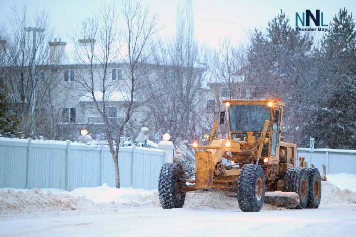 Grader clearing snow on street. Image: depositphotos.com