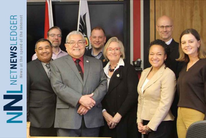 Beecher Bay (Sc’ianew) First Nation land claim settled. Chief Cripps and Minister Bennett with members of Council
