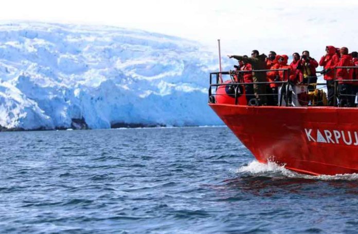 The scientific investigation vessel of the Chilean Antarctic Institute (INACH), named Karpuj, is seen in front of the Collins Glacier at King George island, Antarctica, Chile, February 2, 2019. REUTERS/Fabian Cambero