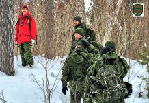 Canadian Rangers Have ‘Awesome’ Time Teaching Winter Survival Skills Ranger Quinton Anishinabie leads southern soldiers on snowshoes during the exercise. Image Credit Master Corporal Jason Hunter, Canadian Rangers