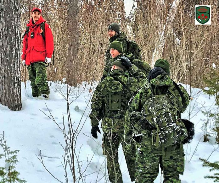 Ranger Quinton Anishinabie leads southern soldiers on snowshoes during the exercise. Image Credit Master Corporal Jason Hunter, Canadian Rangers
