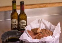 The Art of Staging: Preparing Your Rental for Professional Photos Photo Credit - Claudia Ochnicki Photography: Homemade fresh baked focaccia cut in wedges and served with balsamic and olive oil from A Fine Fit Catering and Consulting