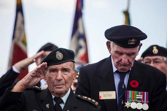 Honorary Colonel David Lloyd Hart salutes during a commemorative ceremony in Dieppe, France on August 19, 2017, which marked the 75th Anniversary of the Dieppe Raid. Photo: ©2017 DND/MDN Canada