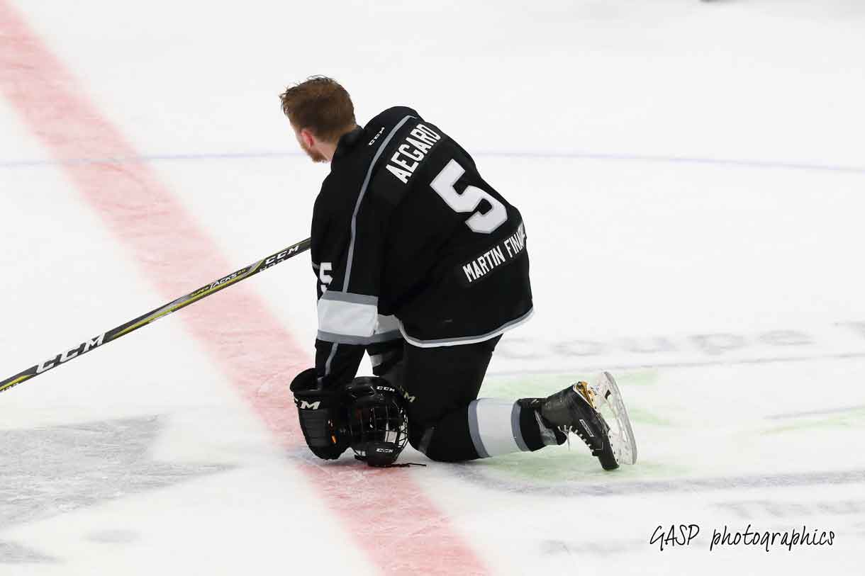 Kings captain, Gareth Aegard, takes a moment at centre ice, to reflect on the past season and the tournament experience