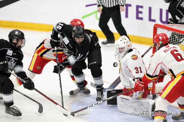 Kings Mackenzie Sedgwick is credited with the game tying goal, as Trenton Morriseau and others watch the puck pass over the shoulder of Jacob Goobie and into the Macs net at 12:42 of the 2nd period.