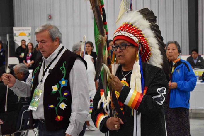 Couchiching First Nation Chief Brian Perrault and Ogichidaa Francis Kavanaugh, Grand Chief of Grand Council Treaty #3 at Grand Entry this morning at the Treaty #3 Spring Assembly being held in Couchiching First Nation.