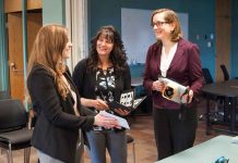 Children’s Visual Health Program Announced Members of Children’s Visual Health Team and Dr. Janet DeMille (MOH) inspecting vision screening tools at TBDHU