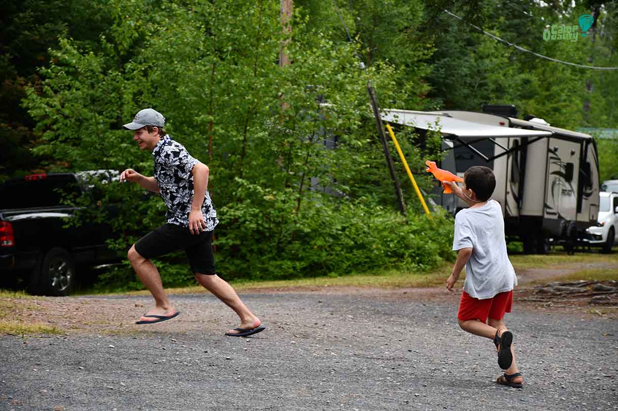 Camper Alessio chases his Companion Branden with a T-Rex water gun. Way to get into the theme, Alessio!