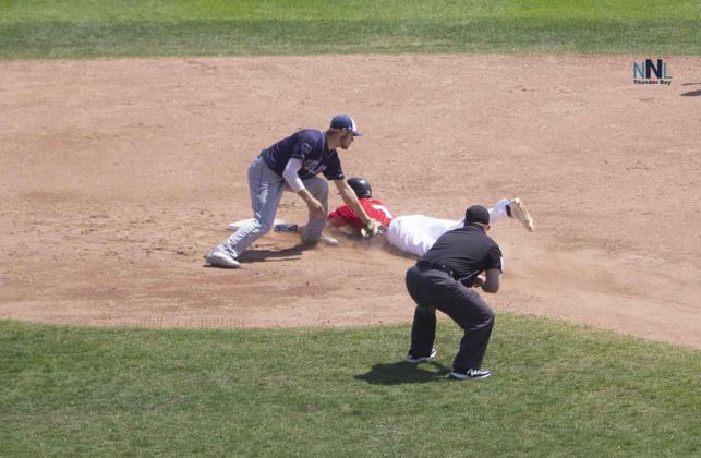 Border Cats #7 called out trying to steal second base.