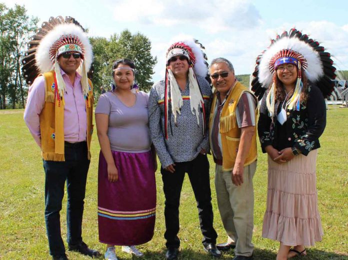 Left to right: Opaskwayak Cree Nation’s (OCN) Chief Sinclair, OCN Junior Chief April Harris, Grand Chief Garrison Settee, OCN Councillor William Lathlin, and OCN Vice-Chief Jennifer Flett gather in OCN during the MKO Annual General Assembly. Grand Chief Settee thanks the OCN community for welcoming the MKO Assembly in Treaty Five Territory from August 13 to 15, 2019.