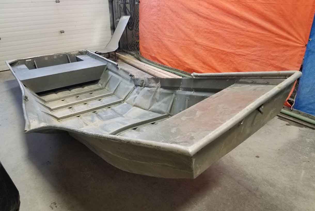 Damaged aluminum boat found by RCMP officers on the shores of the Nelson River during a helicopter search on friday afternoon.